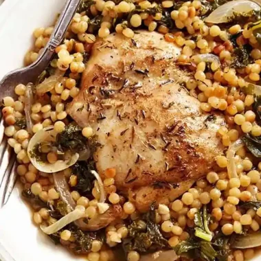 One-Pan Chicken Thighs with Israeli Couscous and Kale