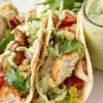 Cod Fish Tacos with Creamy Avocado Sauce