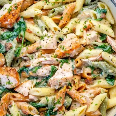 Creamy Salmon Pasta with Spinach and Sun-Dried Tomatoes