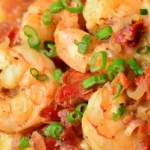 Creamy Cheese Grits with Savory Shrimp and Sun-Dried Tomatoes