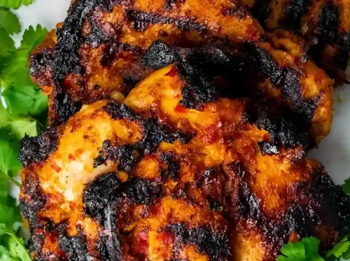 Grilled Honey Harissa Chicken Thighs with Cilantro Cream