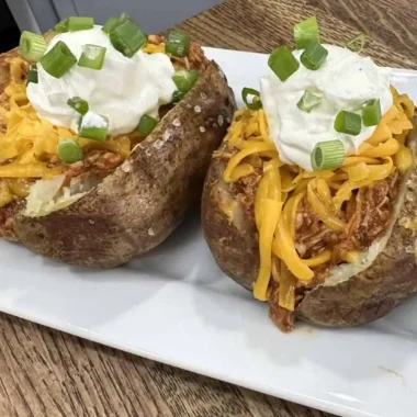 Slow Cooker Shredded BBQ Chicken Stuffed Potatoes